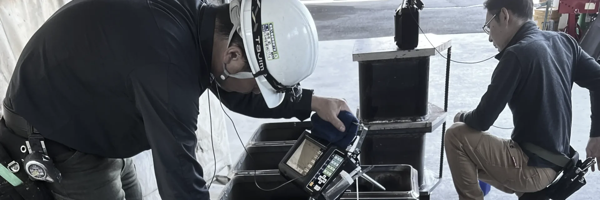 小笠原工業のスタッフ作業中の様子